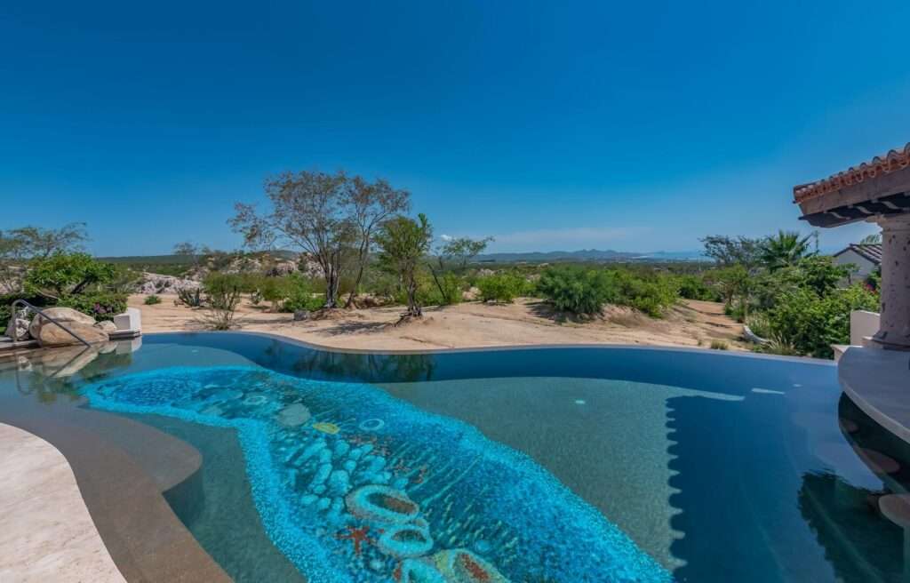 Querencia Section 1- Las Colinas A true one-of-one, The Nivel Estate is a bold architectural statement where scale, craftsmanship, and innovation converge. Spanning 18,000 square feet of seamless indoor-outdoor living, the home was recently featured in The Wall Street Journal. Perched atop Querencia Golf and Beach Club, it commands sweeping 270-degree for sale