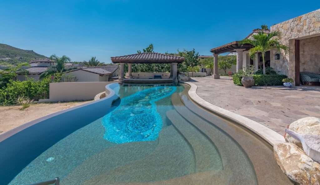 Querencia Section 1- Las Colinas A true one-of-one, The Nivel Estate is a bold architectural statement where scale, craftsmanship, and innovation converge. Spanning 18,000 square feet of seamless indoor-outdoor living, the home was recently featured in The Wall Street Journal. Perched atop Querencia Golf and Beach Club, it commands sweeping 270-degree for sale