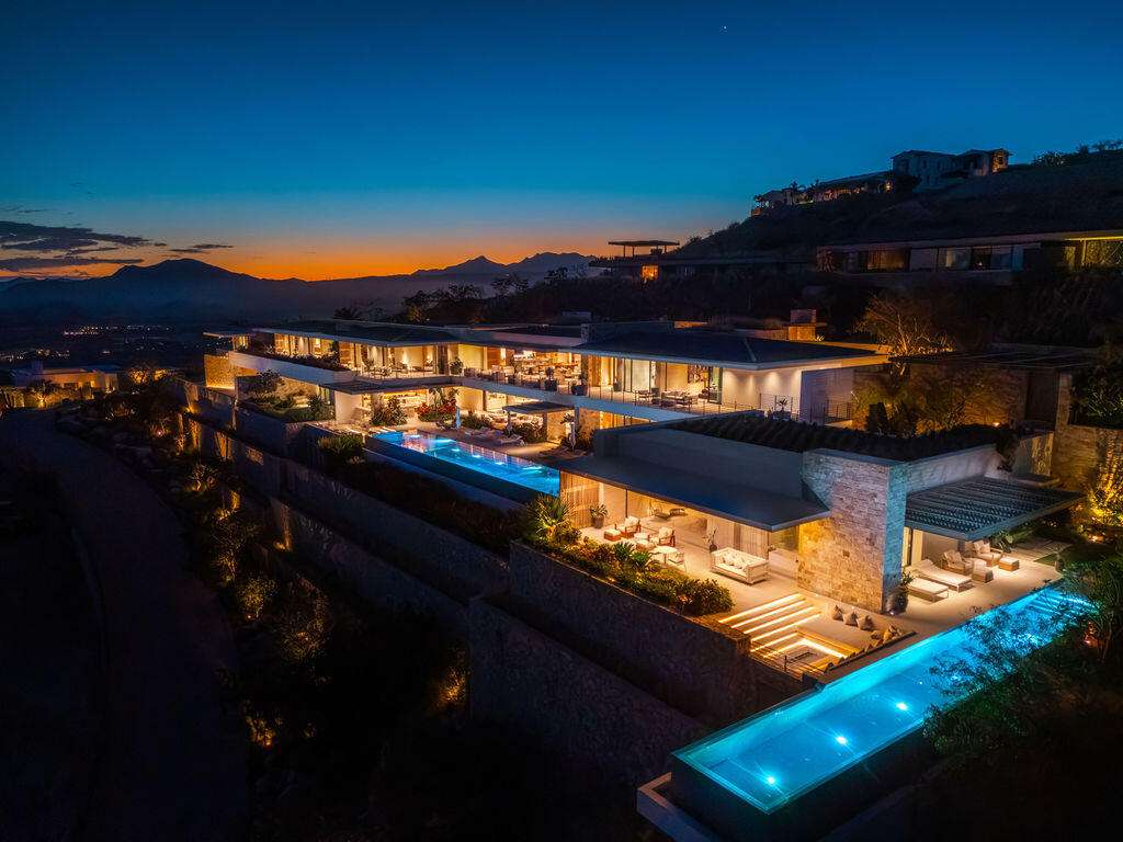 Querencia Section 1- Las Colinas A true one-of-one, The Nivel Estate is a bold architectural statement where scale, craftsmanship, and innovation converge. Spanning 18,000 square feet of seamless indoor-outdoor living, the home was recently featured in The Wall Street Journal. Perched atop Querencia Golf and Beach Club, it commands sweeping 270-degree for sale